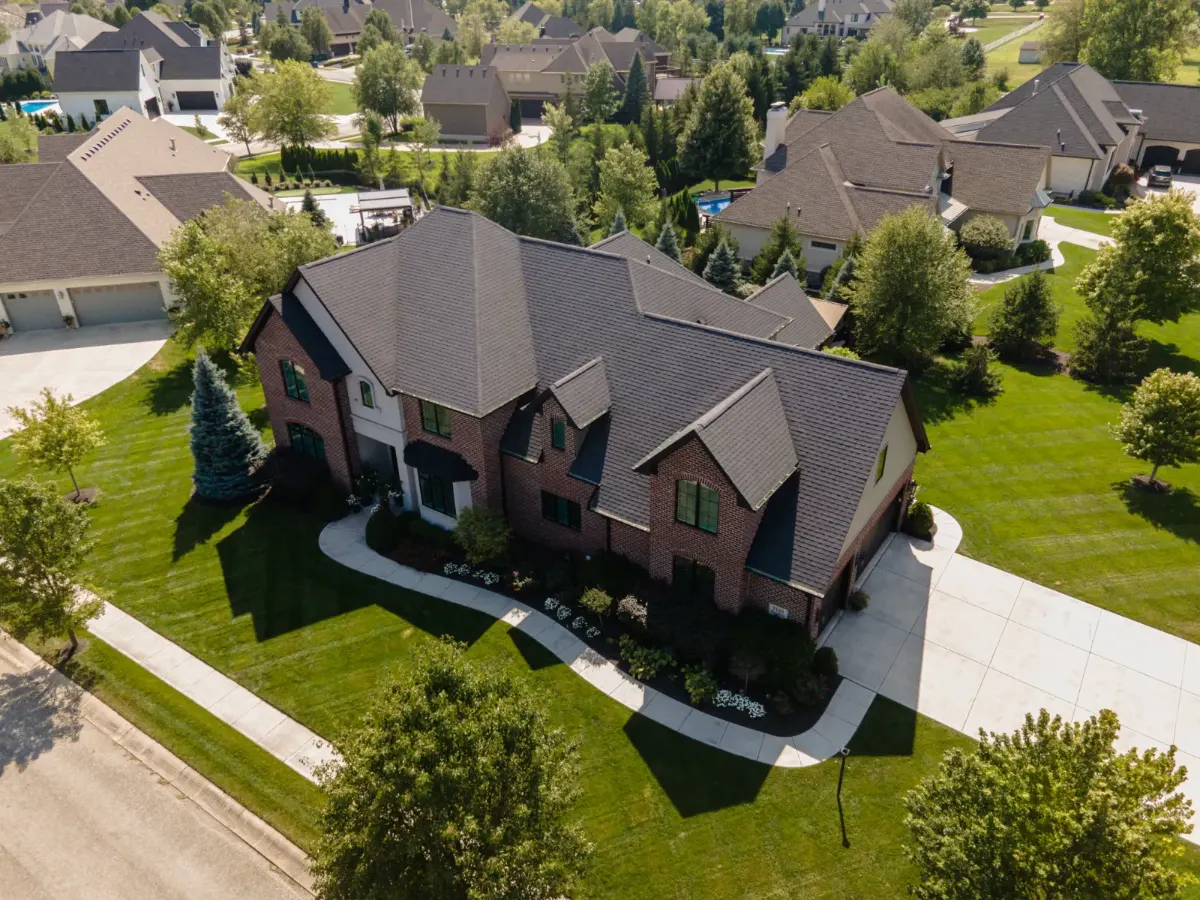 Architectural shingles with ridge vent before restoration in Viking Meadows, Westfield, IN